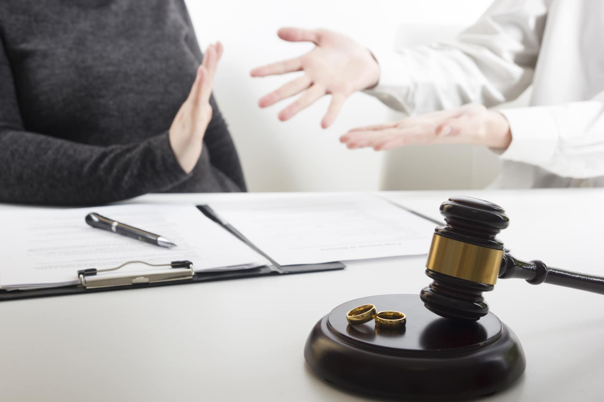 Couple having a disagreement during divorce signing